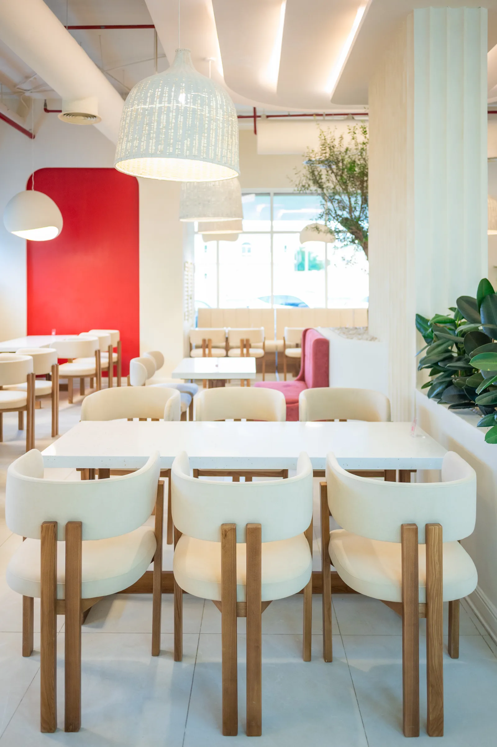 Al Awas dining hall with red feature wall