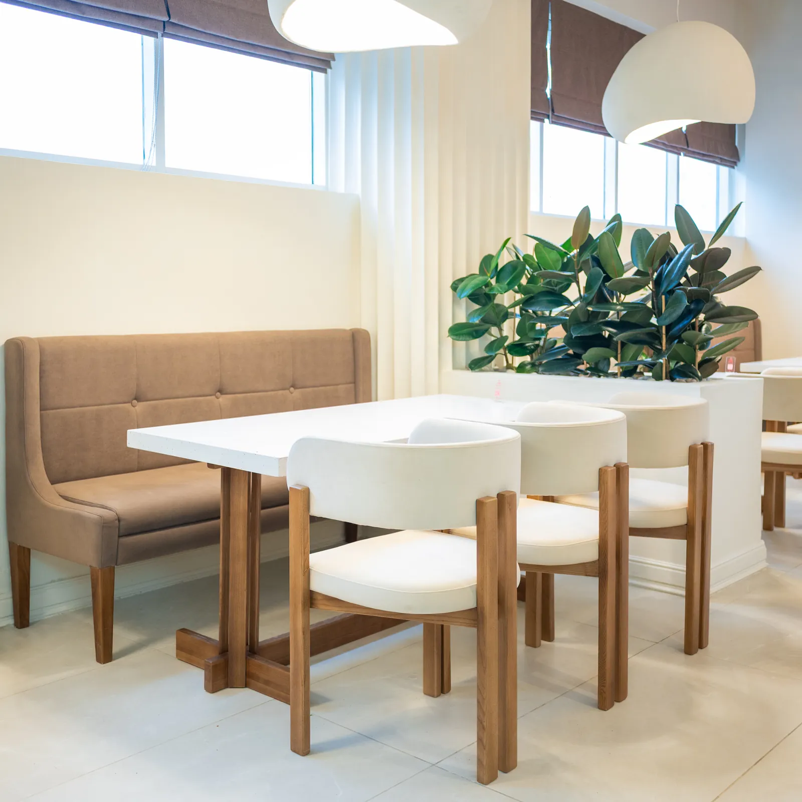al awas banquette seating with greenery